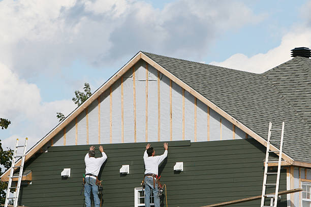 Professional Siding Contractor technician working in Wenham, MA